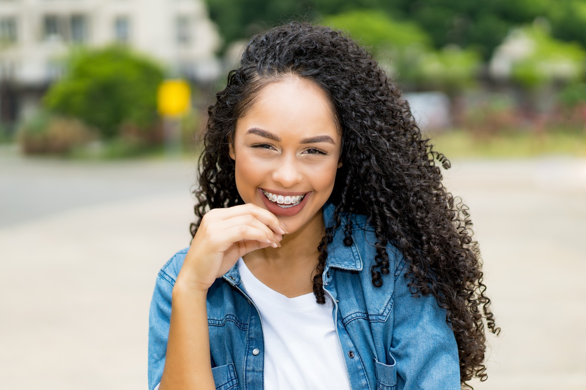 Pretty brazilian young adult woman with retainer orthodontist zionsville